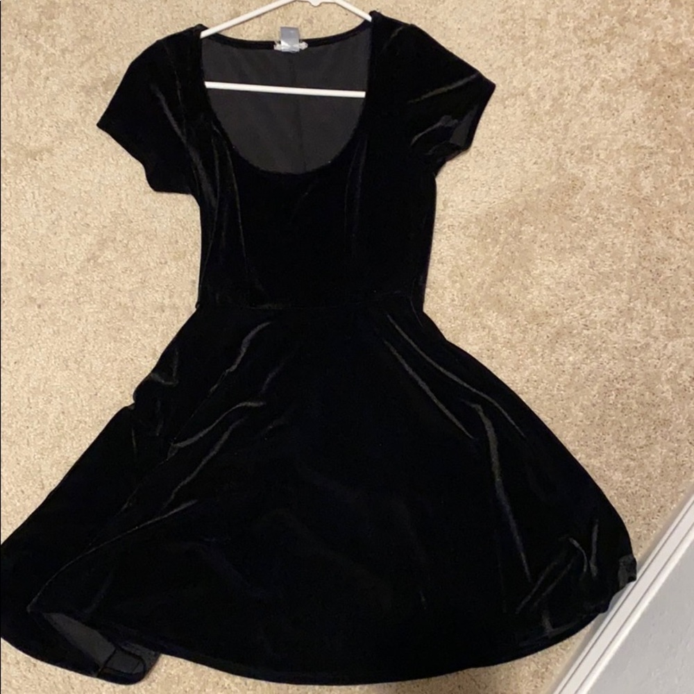 A very cute velvet skater dress. Small size.